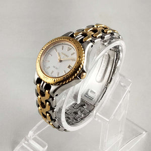 Seiko SQ 100 Silver and Gold Tone Watch, Date, Bracelet Strap