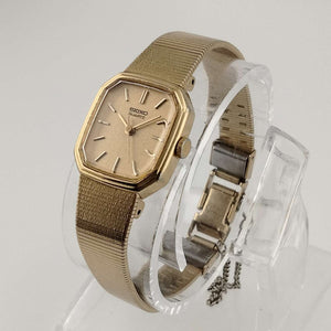 Seiko Women's Petite Gold Tone Watch, Octogon Gold Dial, Smooth Bracelet Strap