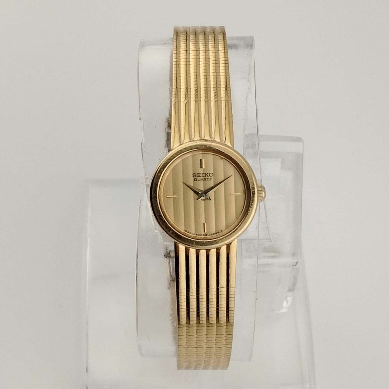 Seiko Women's Gold Tone Watch, Round and Gold Dial, Art Deco Style Strap