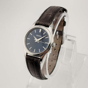 Seiko Unisex Watch, Navy Dial with Silver Tone Details, Brown Leather Strap