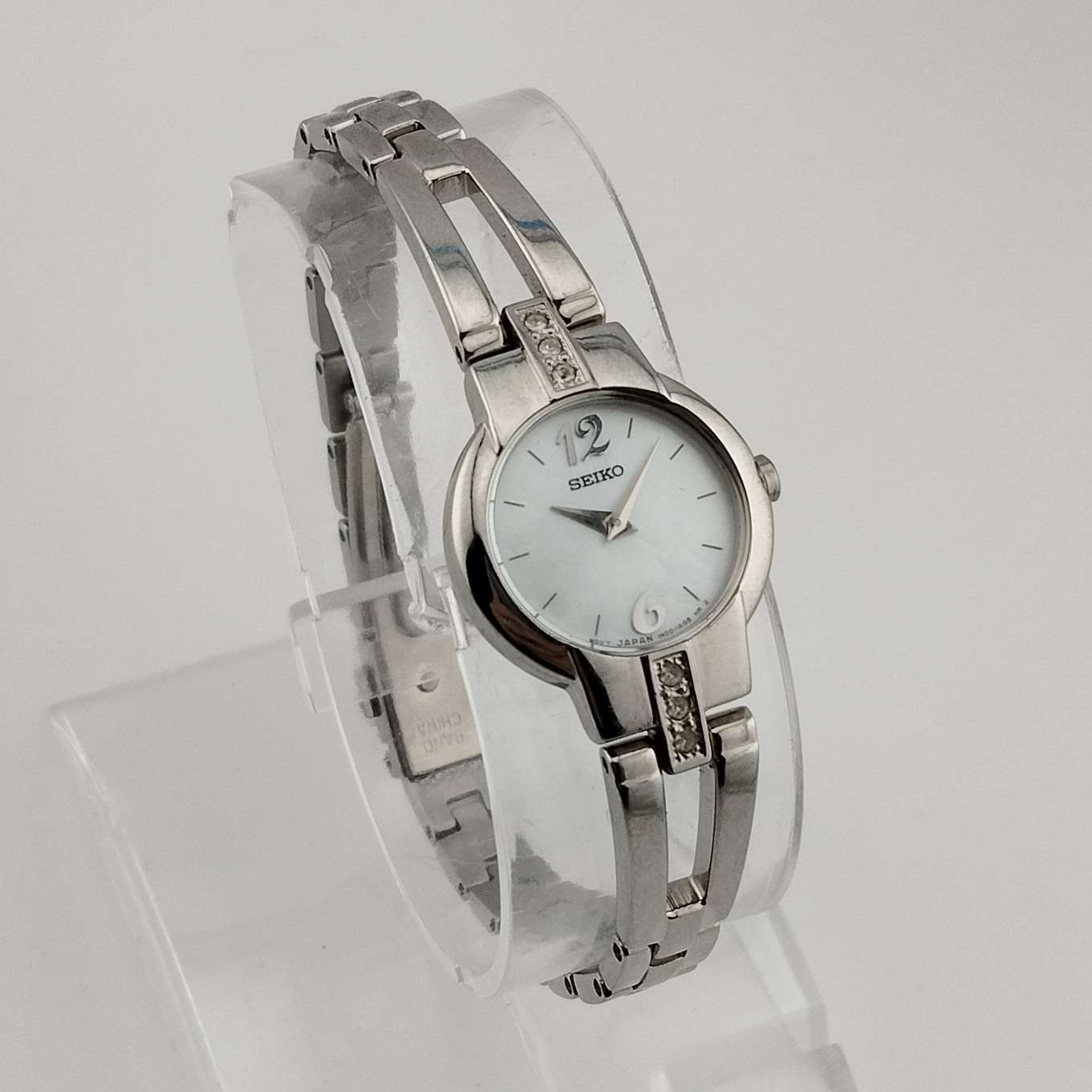 Seiko Women's Silver Tone Watch, Circular Mother of Pearl Dial, Bracelet Strap