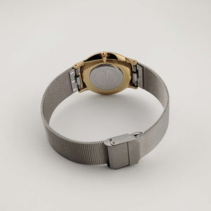 Skagen Men's Silver Tone Watch, Gold Tone Details, Adjustable Mesh Strap