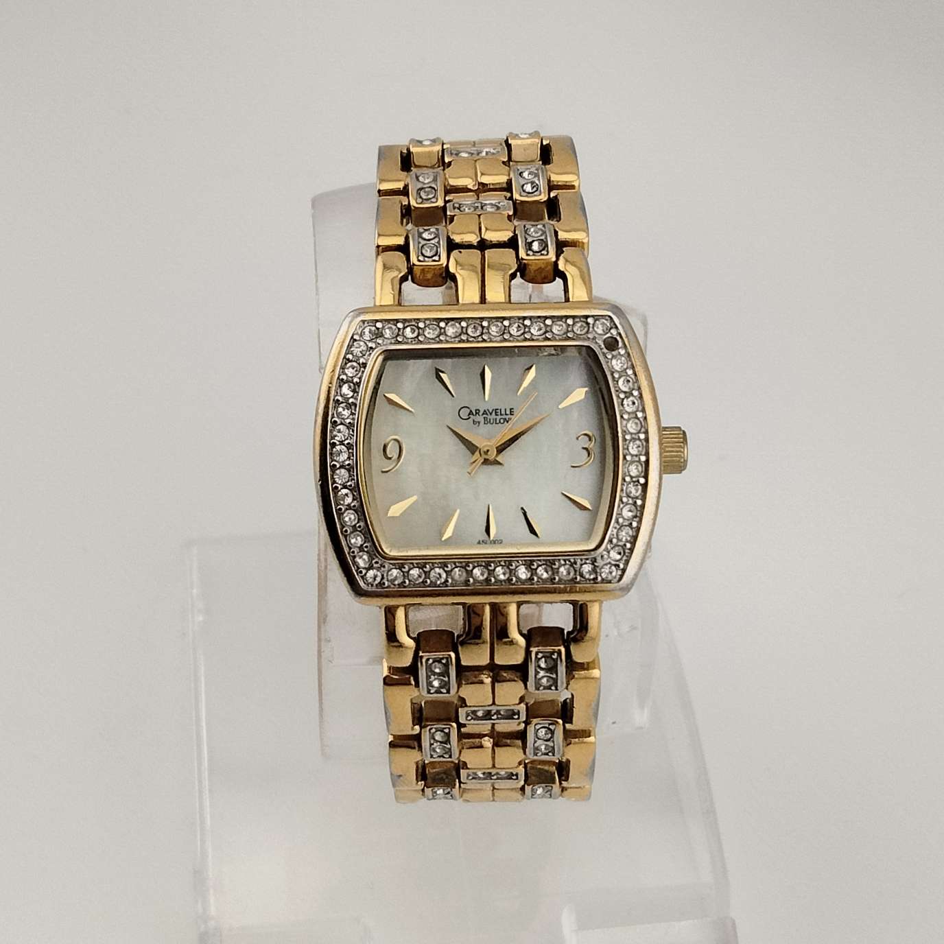 Caravelle by Bulova Gold Tone Women's Watch, Mother of Pearl Dial, Linked Bracelet Strap