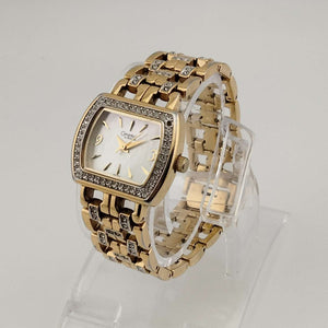 Caravelle by Bulova Gold Tone Women's Watch, Mother of Pearl Dial, Linked Bracelet Strap