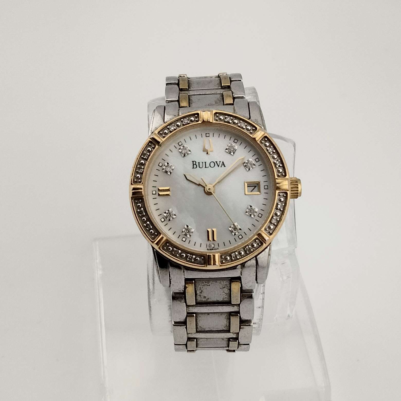 Bulova Women's Silver and Gold Tone Watch, Mother of Pearl Dial, Date Window, Bracelet Strap