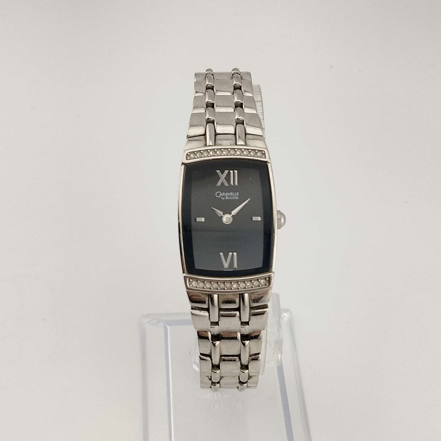 Caravelle by Bulova Women's Watch, Silver Tone, Black Rectangular Dial, Bracelet Strap