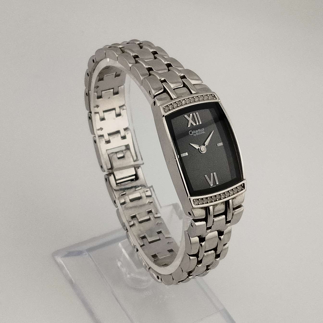 Caravelle by Bulova Women's Watch, Silver Tone, Black Rectangular Dial, Bracelet Strap