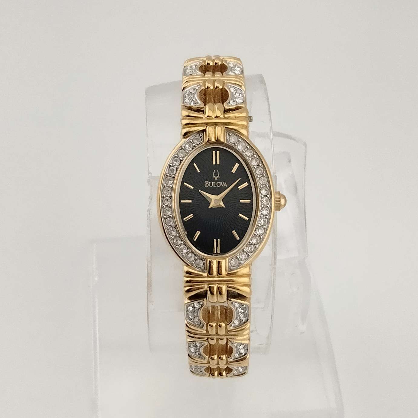 Bulova Gold Tone Women's Watch, Black Oval Dial with Jeweled Bezel, Linked Bracelet Strap