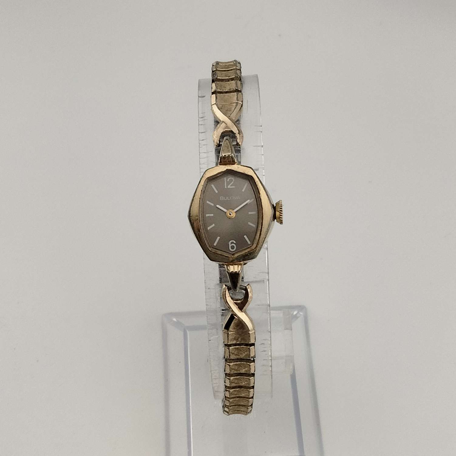 Bulova Petite Gold Tone Watch, Unique Polygonal Oval Dial, Stretch Strap