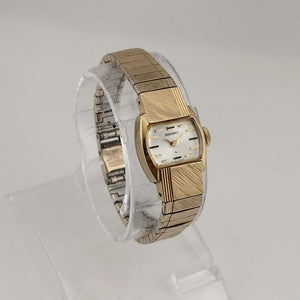 Seiko Petite Gold Tone Watch, Wind Up, Silver Tone Oval Dial, Bracelet Strap