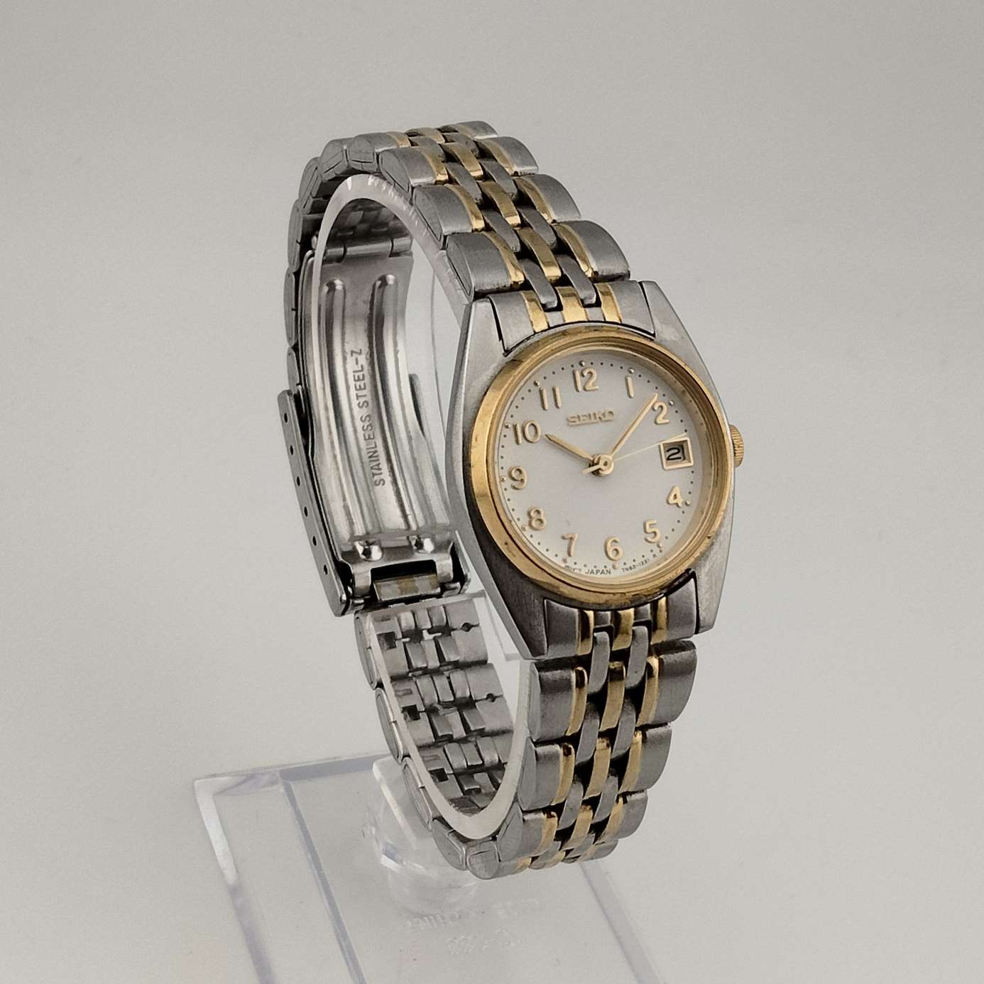 Seiko Unisex Silver Tone Watch, Gold Tone Details, Date Window, Bracelet Strap