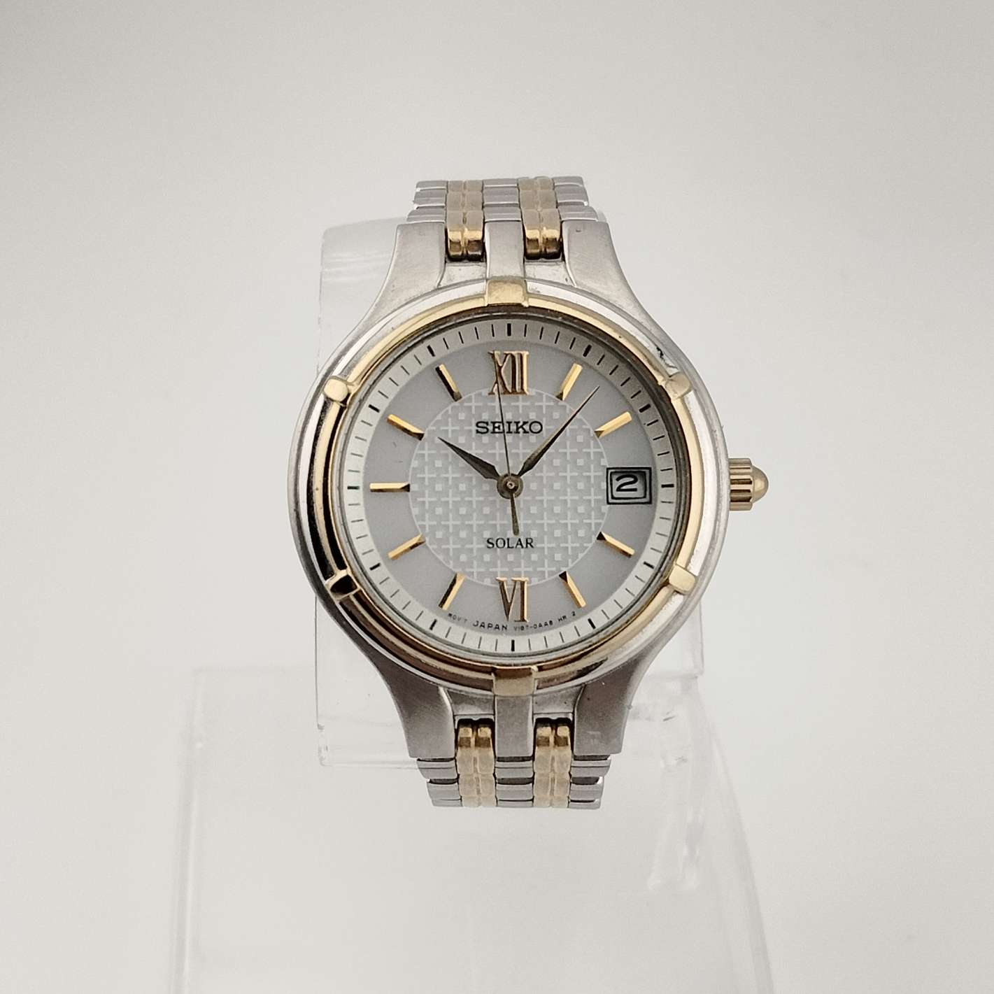 Seiko Unisex Silver Tone Watch, Gold Tone Details, Circular Dial, Date Window, Bracelet Strap