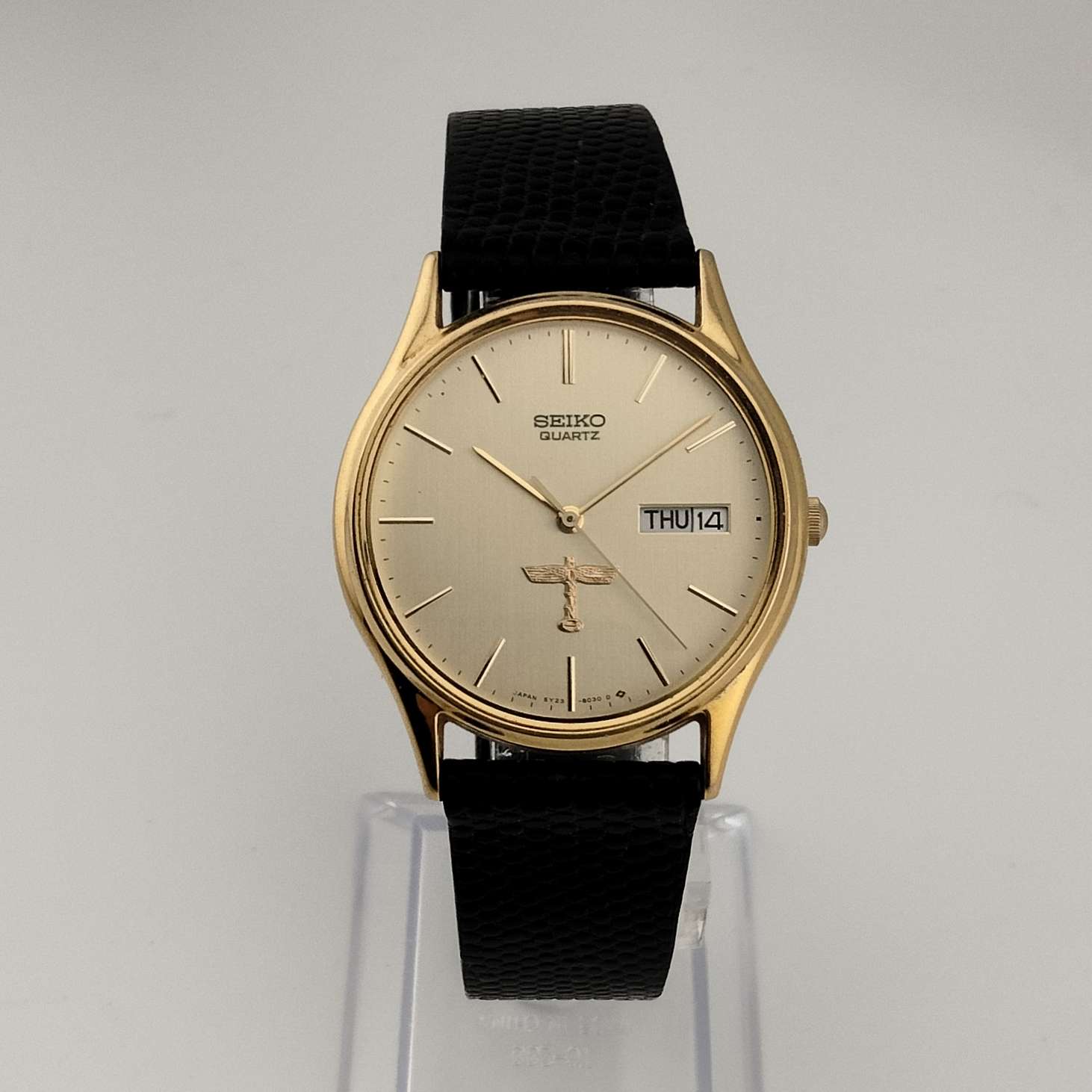 Seiko Unisex Quartz Watch, Gold Tone Details, Date and Day Window, Black Genuine Leather Strap