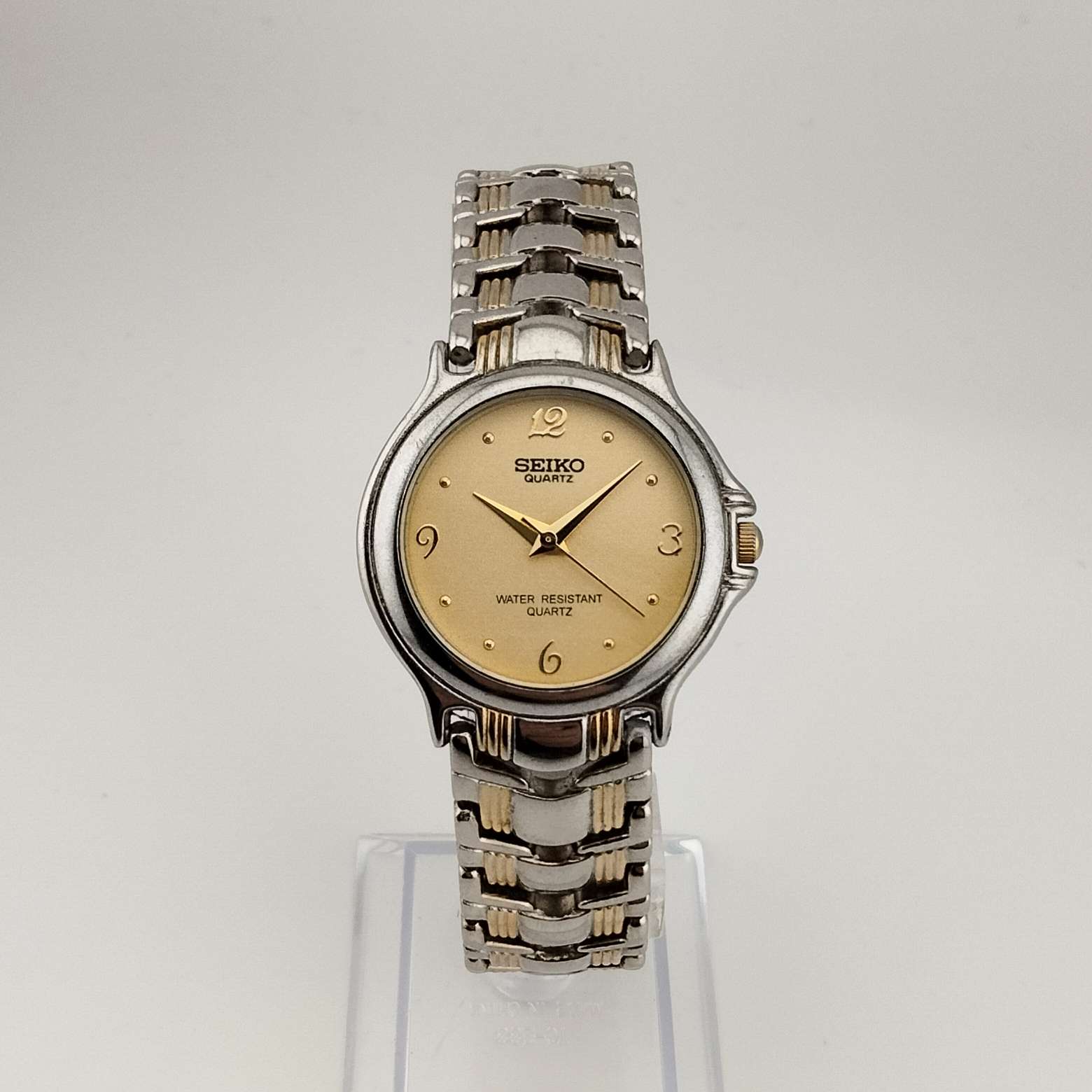 Seiko Unisex Gold and Silver Tone Watch, Circular Dial, Bracelet Strap