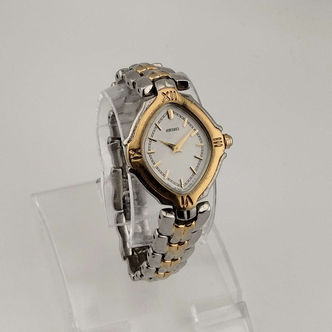 Seiko Unisex Gold and Silver Tone Watch, Unique White Diamond Shaped Dial, Bracelet Strap