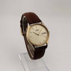 Seiko Unisex Gold Tone Watch, Circular Dial, Date and Day Window, Brown Genuine Leather Strap