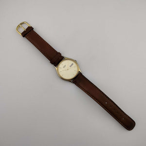 Seiko Unisex Gold Tone Watch, Circular Dial, Date and Day Window, Brown Genuine Leather Strap