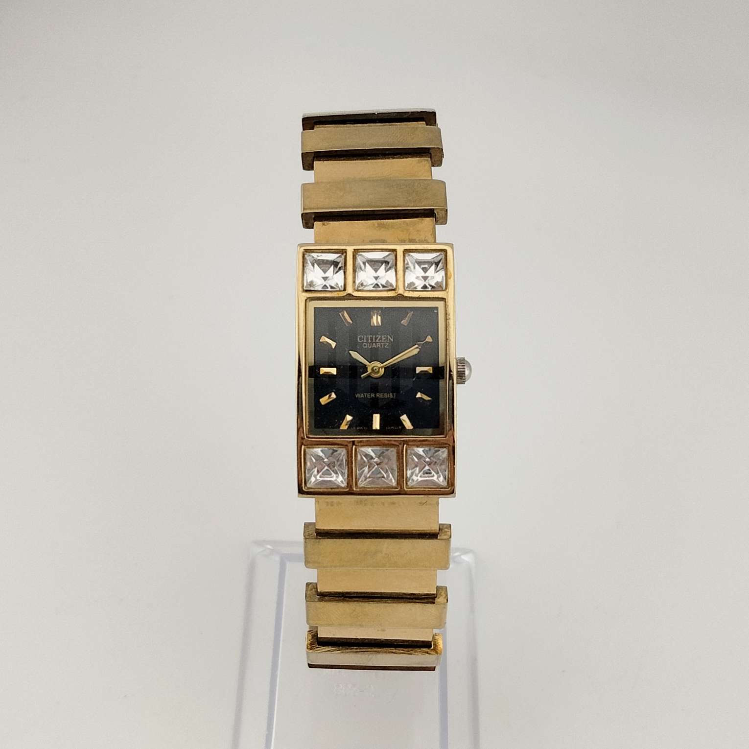 Citizen Unisex Gold Tone Watch, Black Rectangular Dial, Jewel Bezel Detail, Bracelet Strap