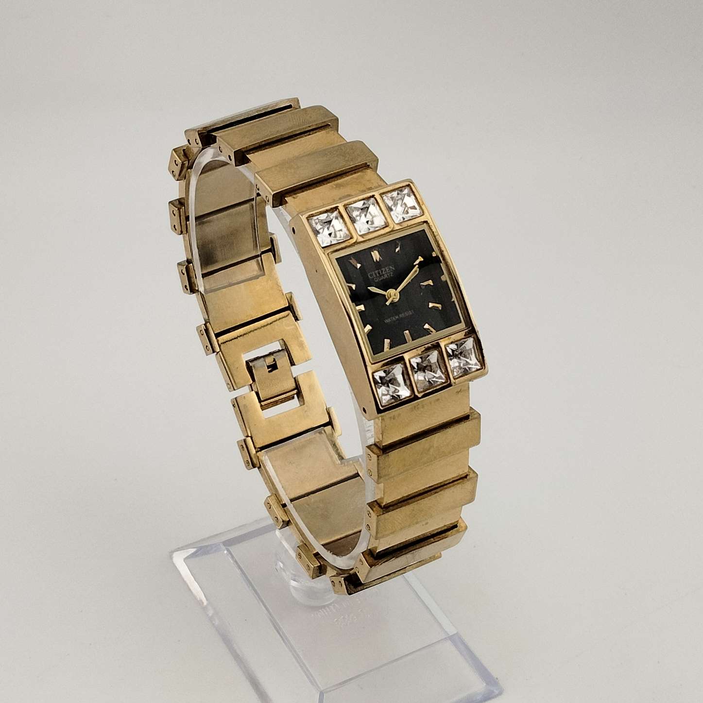 Citizen Unisex Gold Tone Watch, Black Rectangular Dial, Jewel Bezel Detail, Bracelet Strap