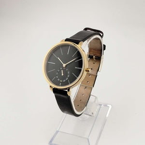 Skagen Unisex Gold Tone Watch, Round Black Chronograph Dial, Genuine Black Leather Strap