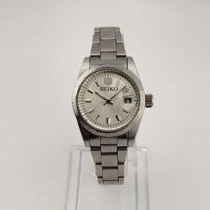 Seiko Men's Silver Tone Watch, Circular Dial, Date Window with Magnifying Detail, Bracelet Strap