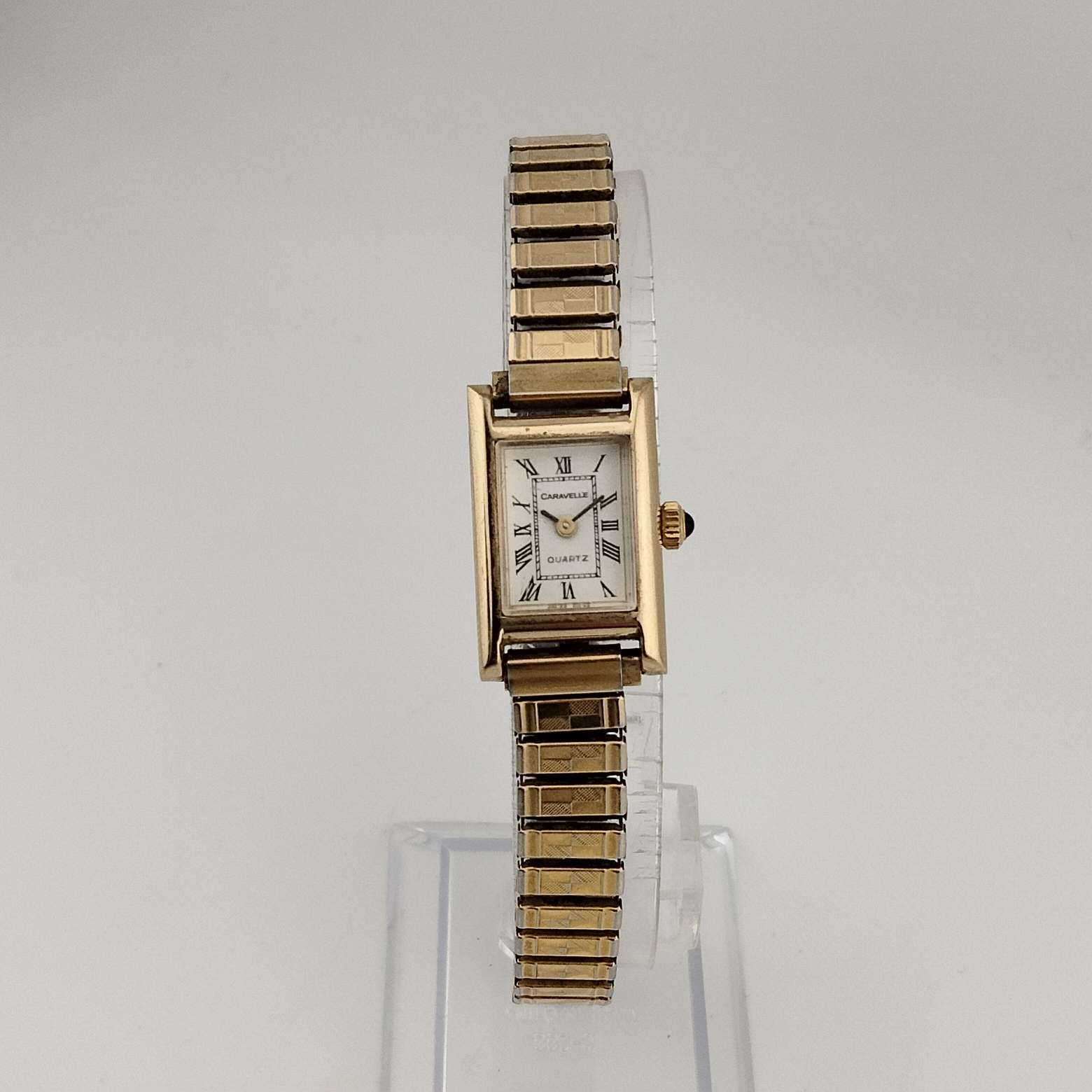 Caravelle by Bulova Gold Tone Unisex Quartz Watch, Rectangular Dial, Stretch Strap