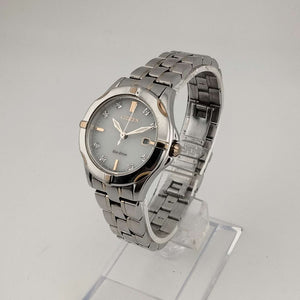 Citizen Unisex Silver Tone Eco-Drive Watch, Gold Tone and Jewel Details, Date Window, Bracelet Strap