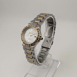 Citizen Women's Silver Tone Eco-Drive Watch, Mother of Pearl Dial, Jeweled Bezel, Date Window, Bracelet Strap