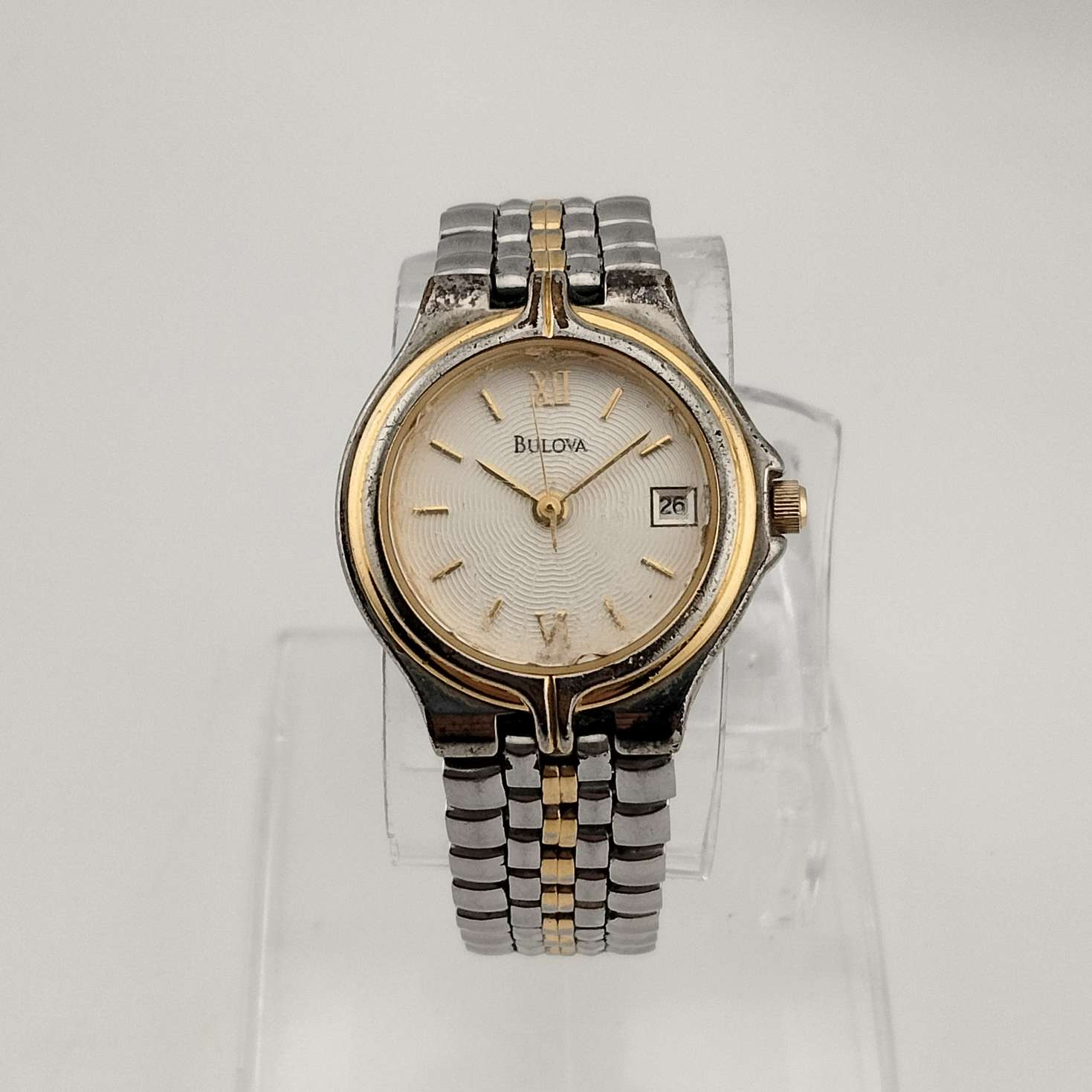 Bulova Unisex Silver Tone Watch, Gold Tone Details, Circular Dial, Date Window, Bracelet Strap