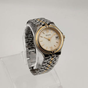 Bulova Unisex Silver Tone Watch, Gold Tone Details, Circular Dial, Date Window, Bracelet Strap