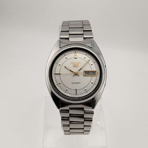 Seiko Silver Tone Automatic Watch, Gold Tone Accents, Circular Dial, Date and Day Window, Bracelet Strap