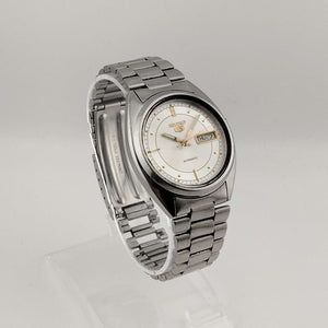 Seiko Silver Tone Automatic Watch, Gold Tone Accents, Circular Dial, Date and Day Window, Bracelet Strap