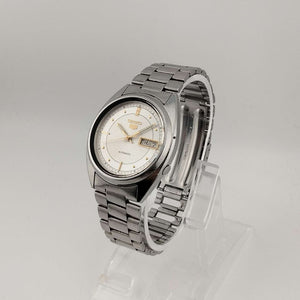 Seiko Silver Tone Automatic Watch, Gold Tone Accents, Circular Dial, Date and Day Window, Bracelet Strap