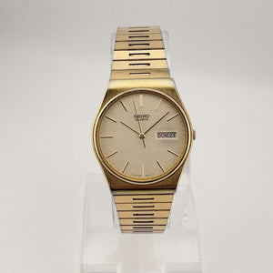 Seiko Unisex Gold Tone Quartz Watch, Circular Dial, Date and Day Window, Adjustable Link Strap