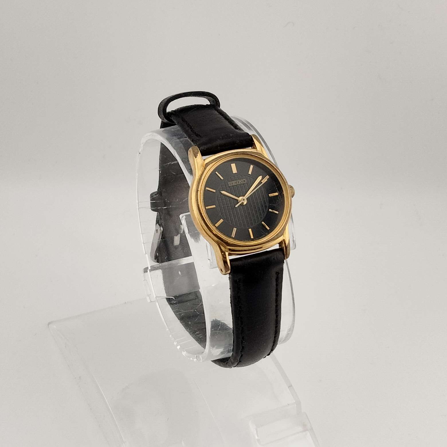 Seiko Unisex Gold Tone Watch, Black Circular Dial, Black Genuine Leather Strap