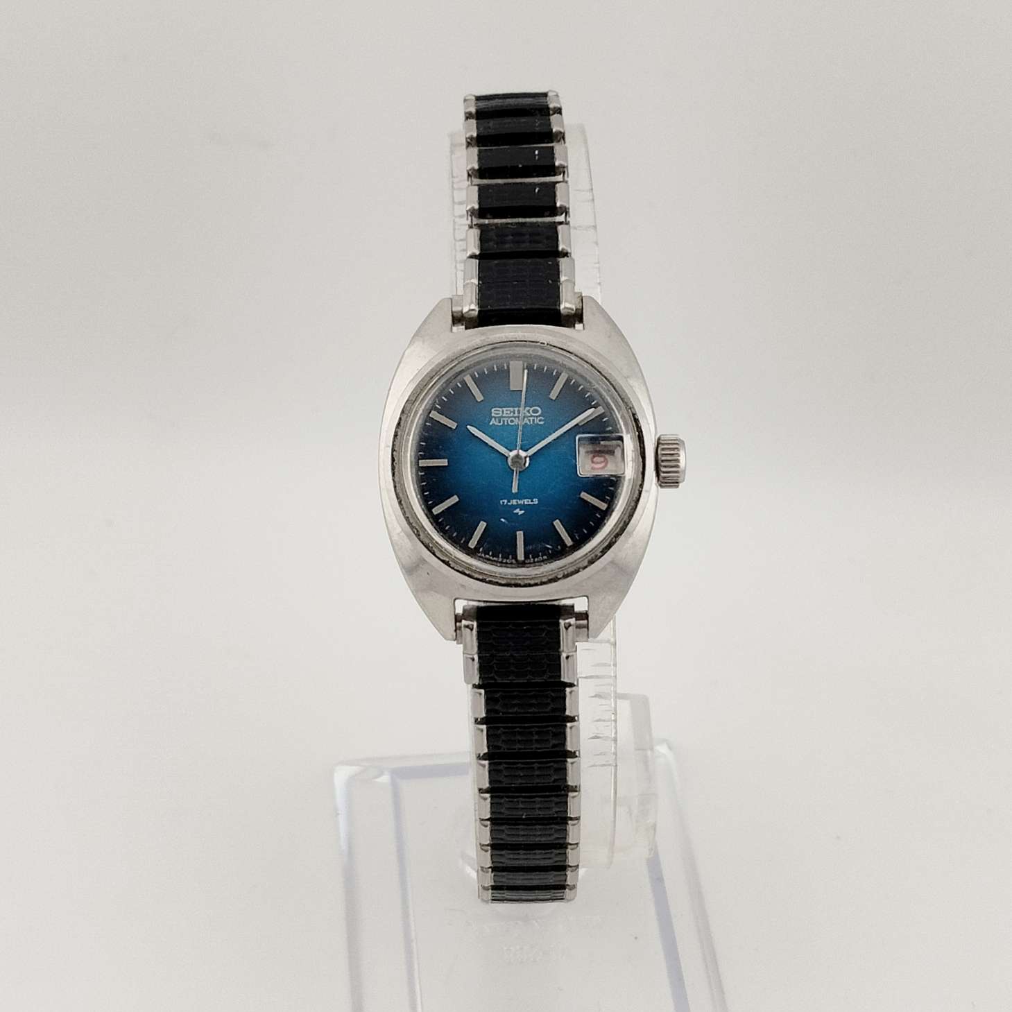 Seiko Silver Tone Automatic Watch, Circular Blue Dial, Date Window with Magnifying Detail, Stretch Strap