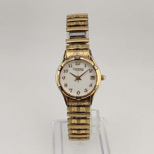 Caravelle by Bulova Unisex Gold Tone Quartz Watch, White Round Dial, Date Window, Stretch Strap