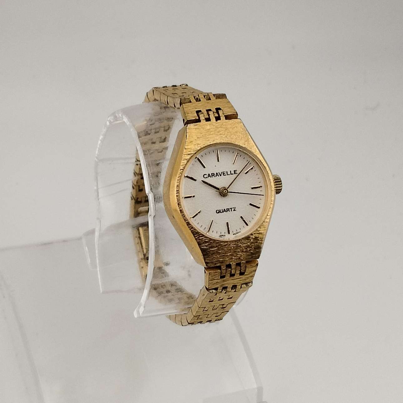 Caravelle by Bulova Women's Gold Tone Quartz Watch, White Round Dial, Bracelet Strap