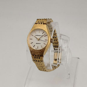 Caravelle by Bulova Women's Gold Tone Quartz Watch, White Round Dial, Bracelet Strap