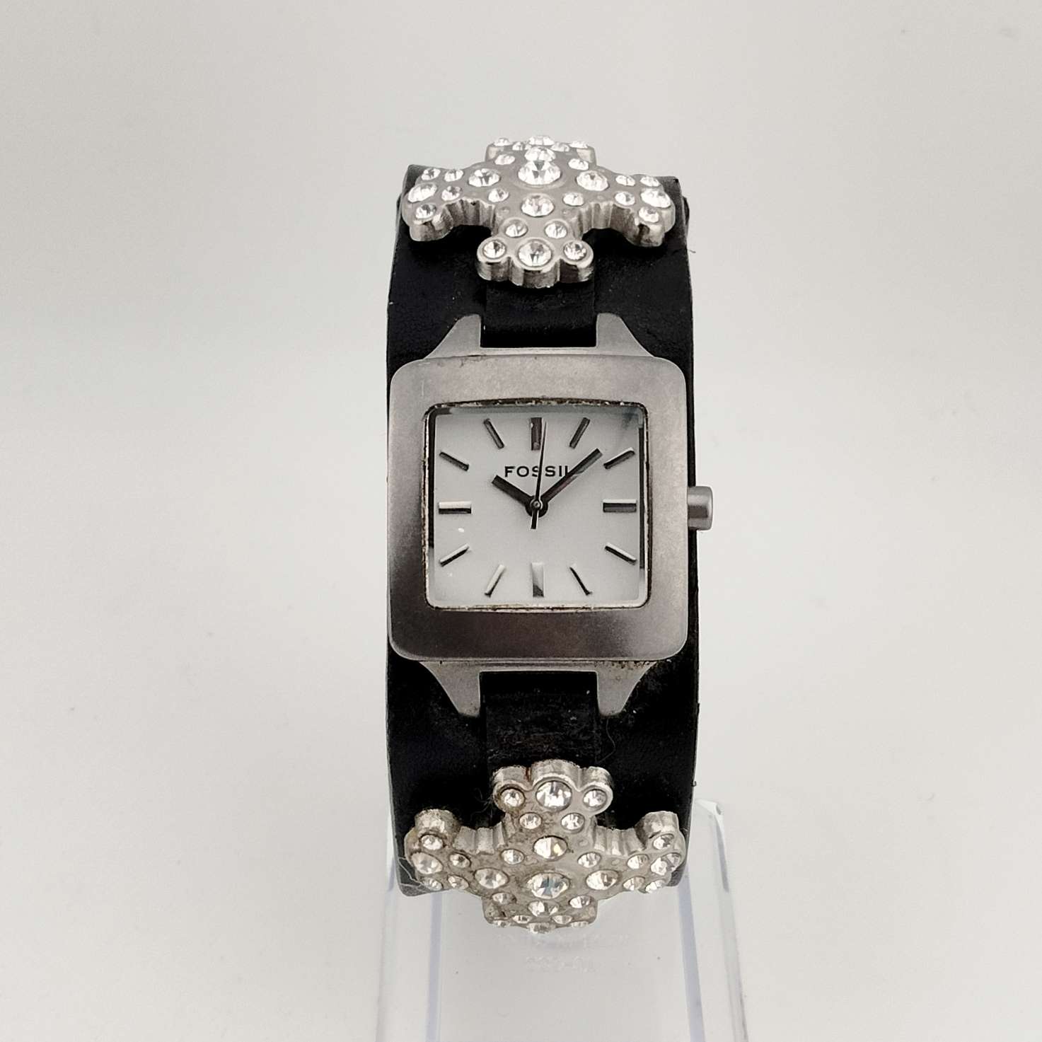 Fossil Women's Silver Tone Watch, White Square Dial, Large Jeweled Cross Detail, Wide Genuine Black Leather Strap