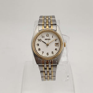 Seiko Men's Silver Tone Watch, Gold Tone Accents, Round White Dial, Date Window, Bracelet Strap