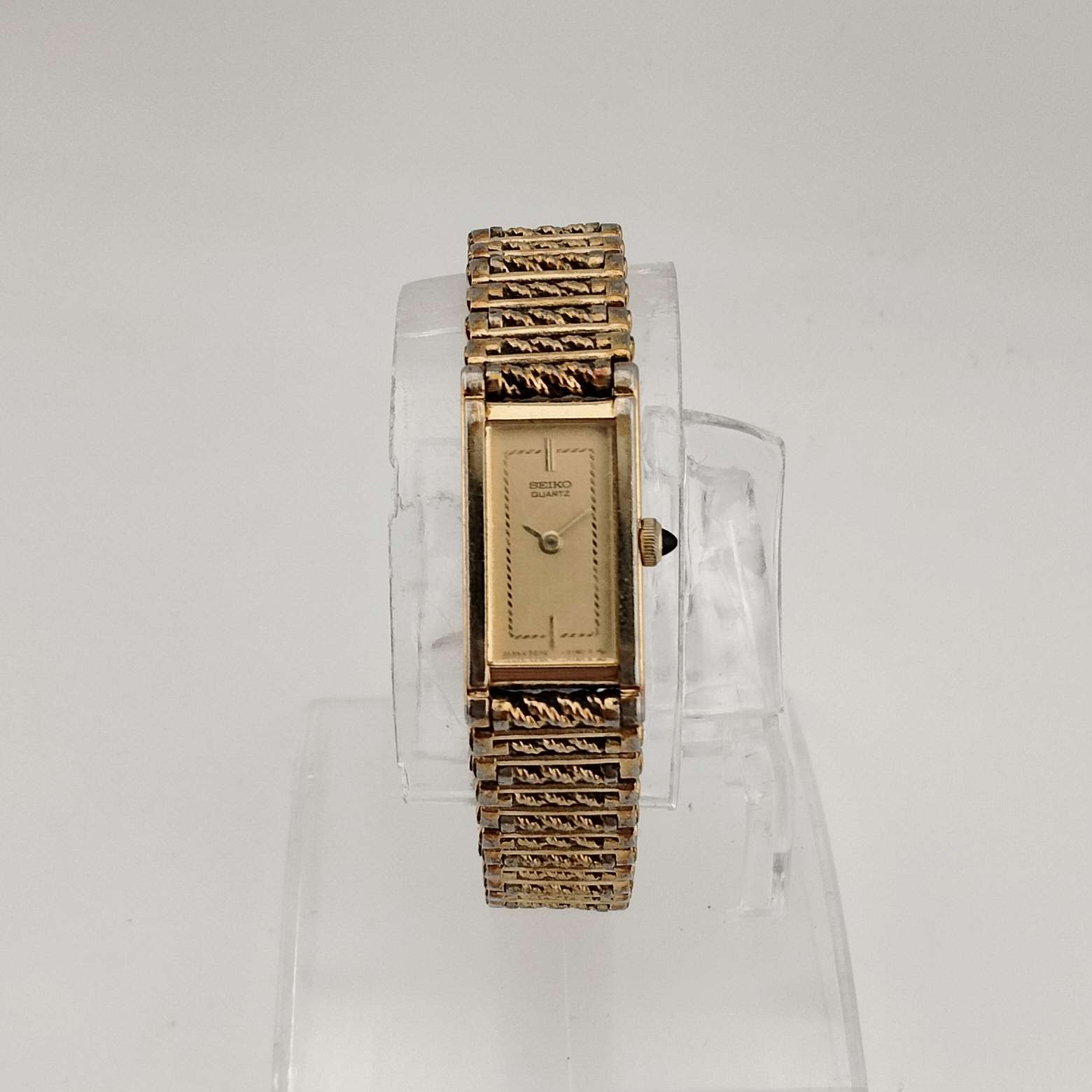 Seiko Women's All Gold Tone Quartz Watch, Elongated Rectangular Dial, Rope Detail on Face, Bracelet Strap