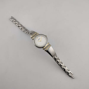 Seiko Women's Silver Tone Watch, Gold Tone Details, Round White Face, Jewel Bezel Details, Bracelet Strap