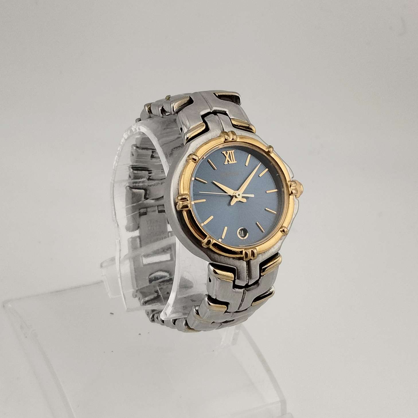 Seiko Silver Tone Watch, Gold Tone Accents, Round Blue Dial, Date Window, Bezel Detail, Bracelet Strap