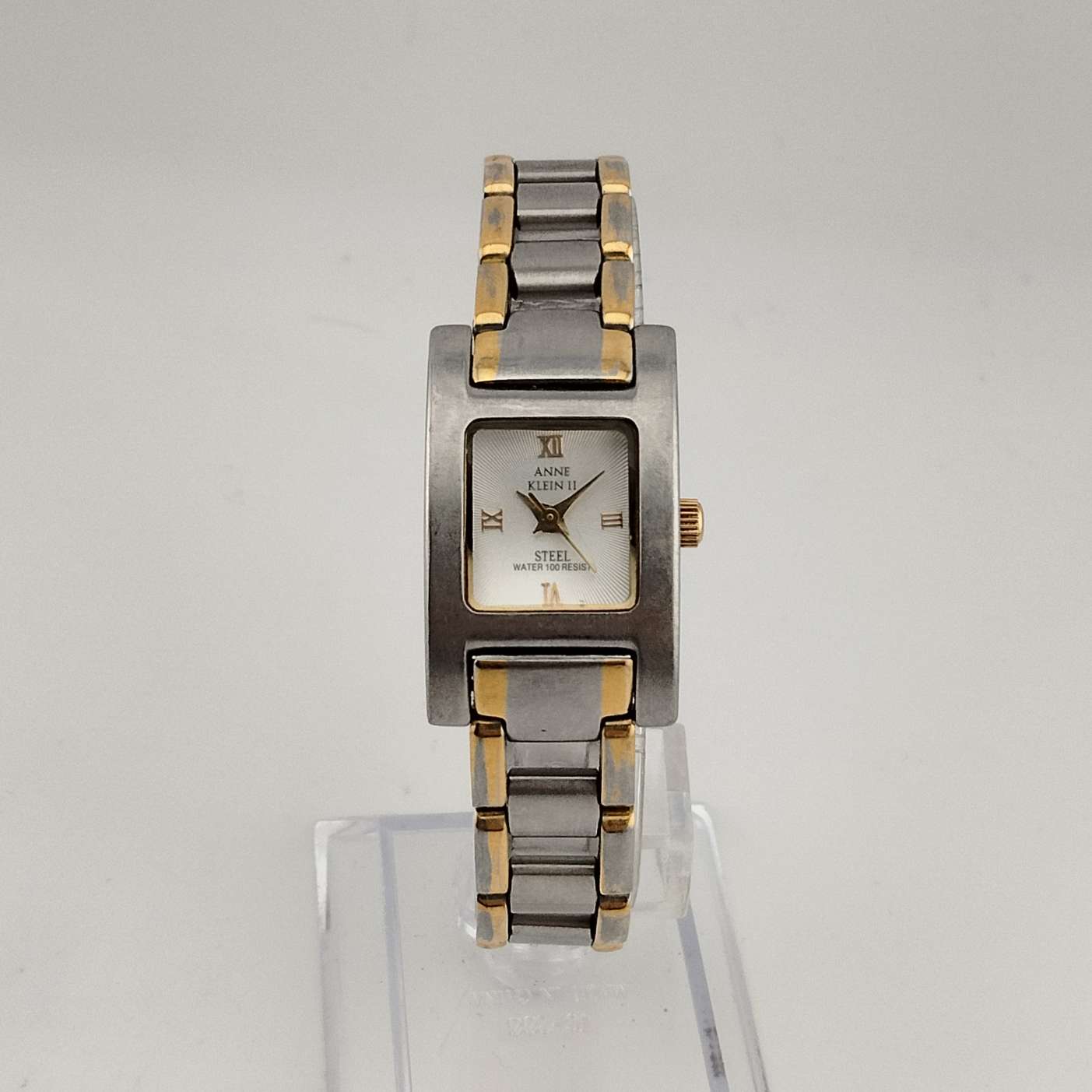 Anne Klein Women's Silver Tone Watch, Gold Tone Accents, Rectangular Dial, Link Strap