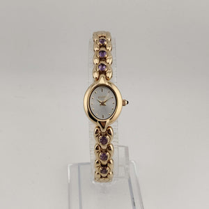 Elgin Women's Gold Tone Watch, Oval Dial, Purple Stone Details, Link Strap