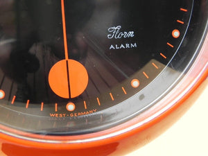 I Like Mike's Mid Century Modern Florn Orange Round Pedestal Alarm Clock