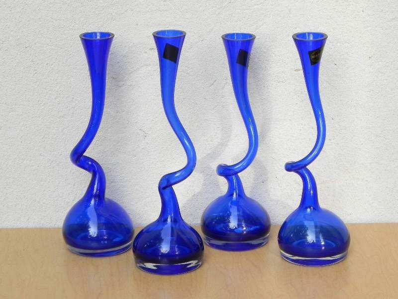 https://www.mikesmcm.com/cdn/shop/files/i-like-mike-s-mid-century-modern-wall-decor-art-cobalt-blue-makora-handblown-glass-twisted-neck-vase-price-is-for-one-17796021701_1600x.JPG?v=1690496822