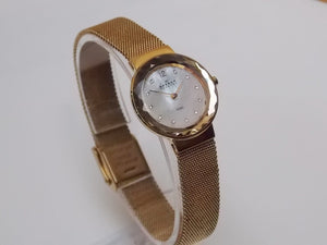 I Like Mikes Mid Century Modern Watches Skagen Women's Goldtone Round Mother of Pearl Dial Jewel Number Markers Facet Cut Border Mesh Band